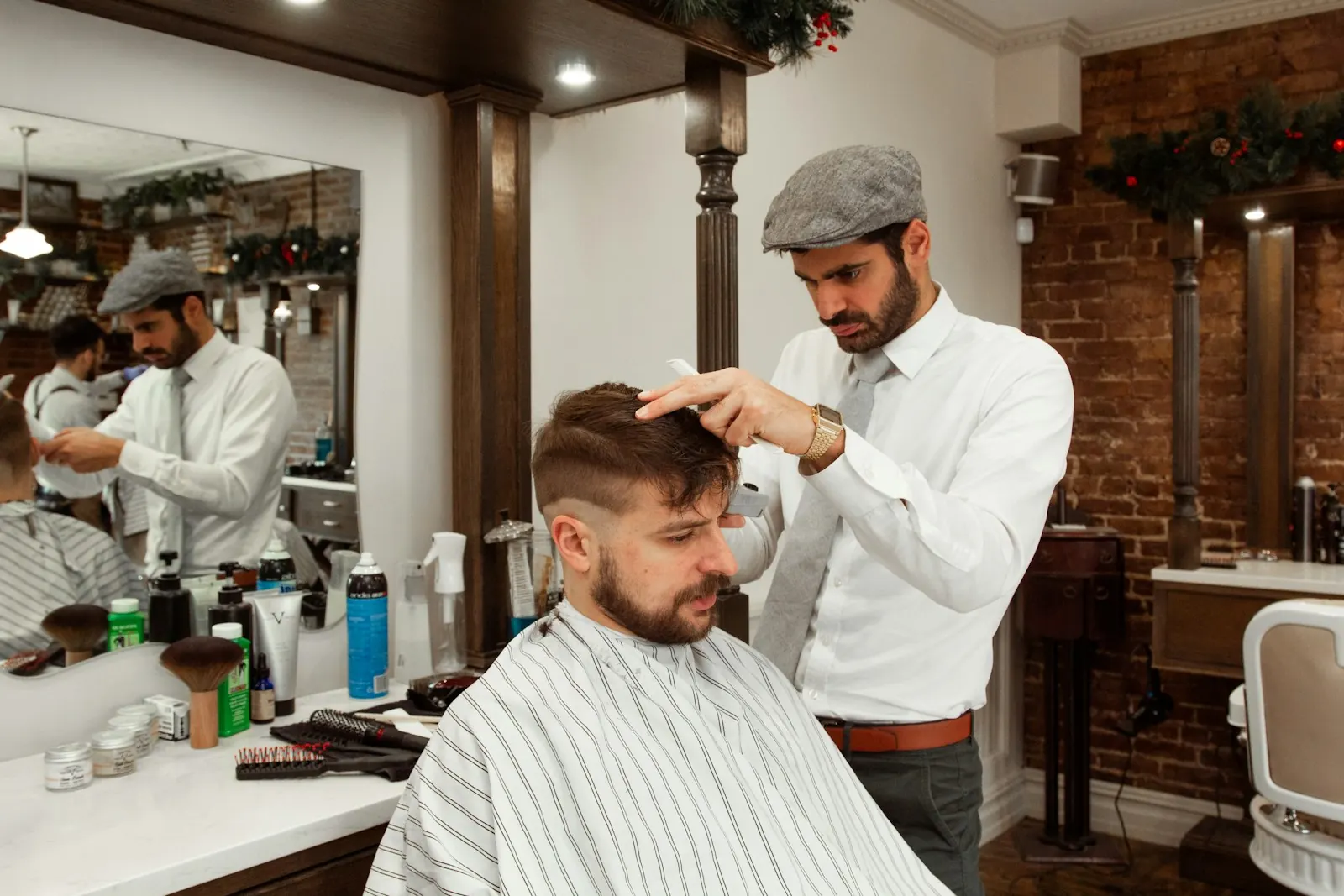 Barber at work in a bright neighborhood barbershop